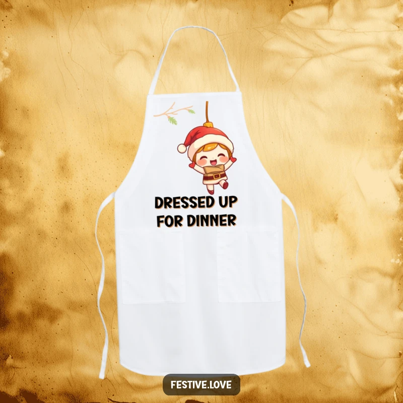 Funny apron showing a giggling Christmas ornament character swinging merrily, perfect for humorous holiday baking.