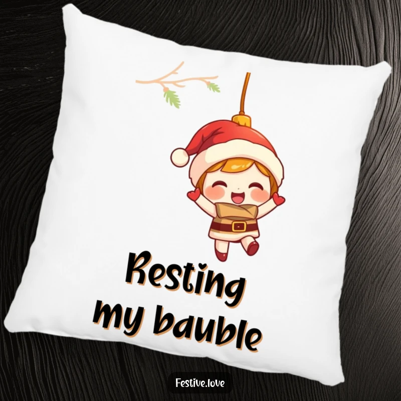 Funny pillow featuring a giggling Christmas ornament character swinging merrily, providing soft, humorous, and festive decor.
