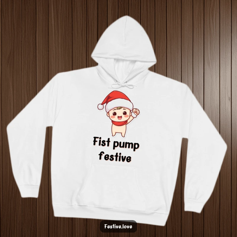 Funny hoodie featuring a Santa hat-wearing character’s joyful and triumphant fist pump, perfect for celebrating holiday achievements.