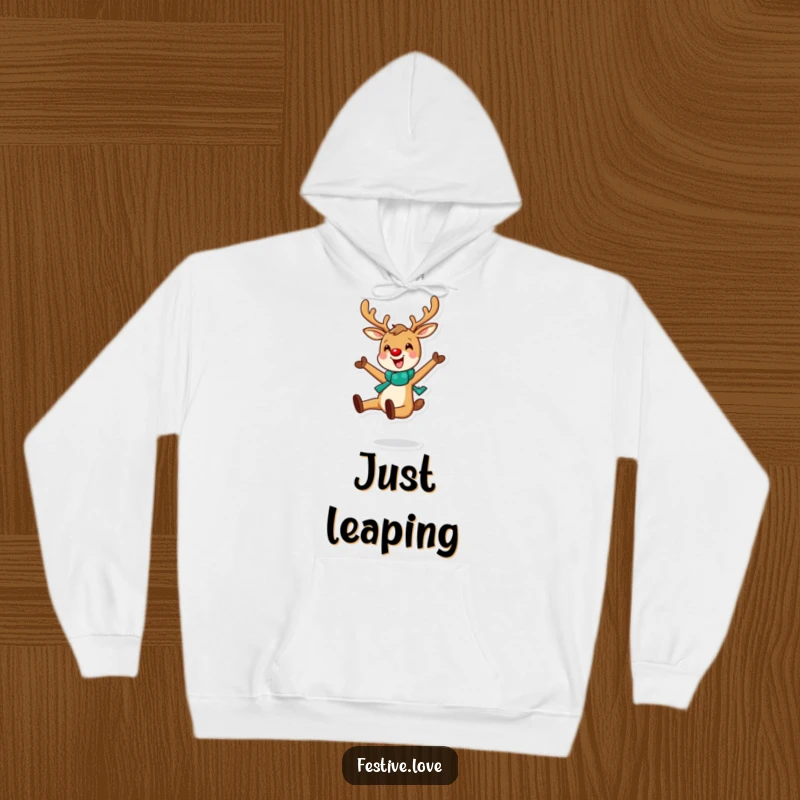 Funny hoodie with a cheerful reindeer leaping with infectious joy, perfect for cozy holiday comfort.