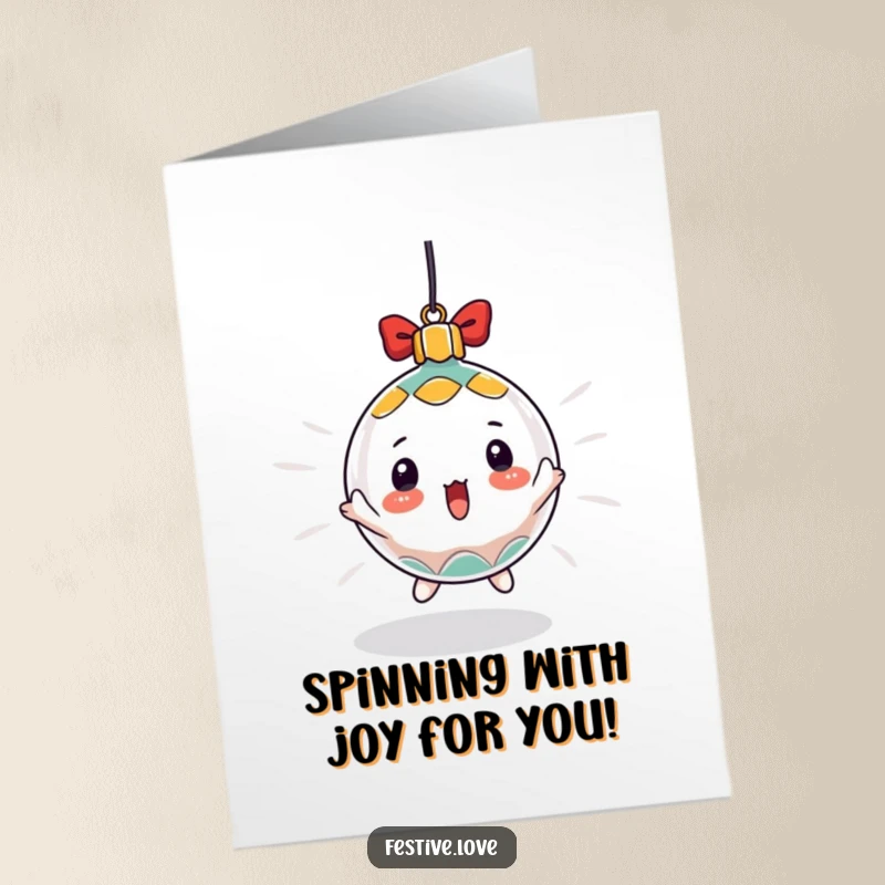 Free Printable Birthday Card: A wide-eyed Christmas ornament spinning crazily, looking utterly surprised.