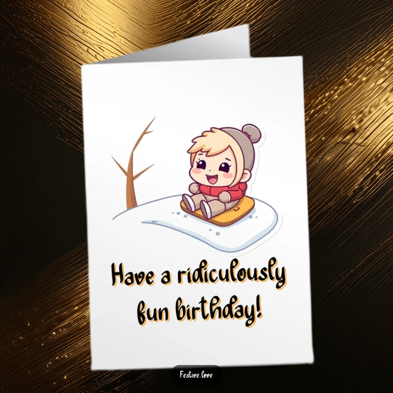 Funny free printable birthday card showing a character gleefully sliding down a snowy hill with a huge grin, embracing the winter fun.