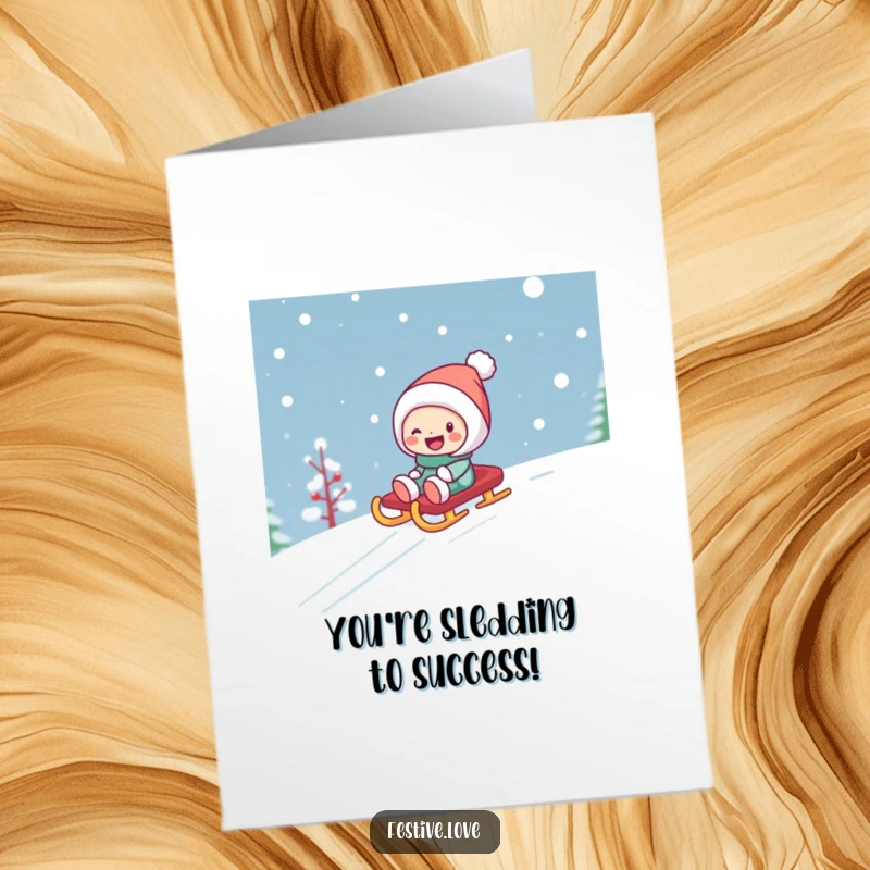 Funny Free Printable Congratulations Card: A happy character gleefully slides down a snowy slope on a sled, celebrating success.