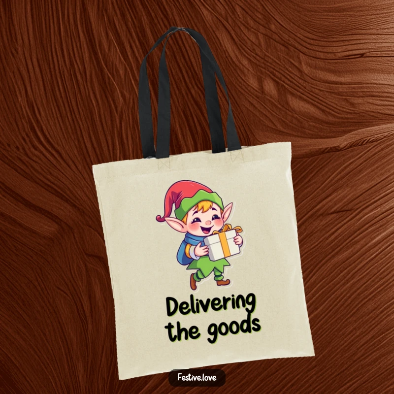 Funny jolly elf tote bag with a happy cartoon elf character delivering a gift with a big grin, perfect for holiday errands.